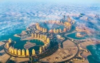 Aerial view of the Pearl-Qatar island in Doha through the morning fog - Qatar, the arab Gulf